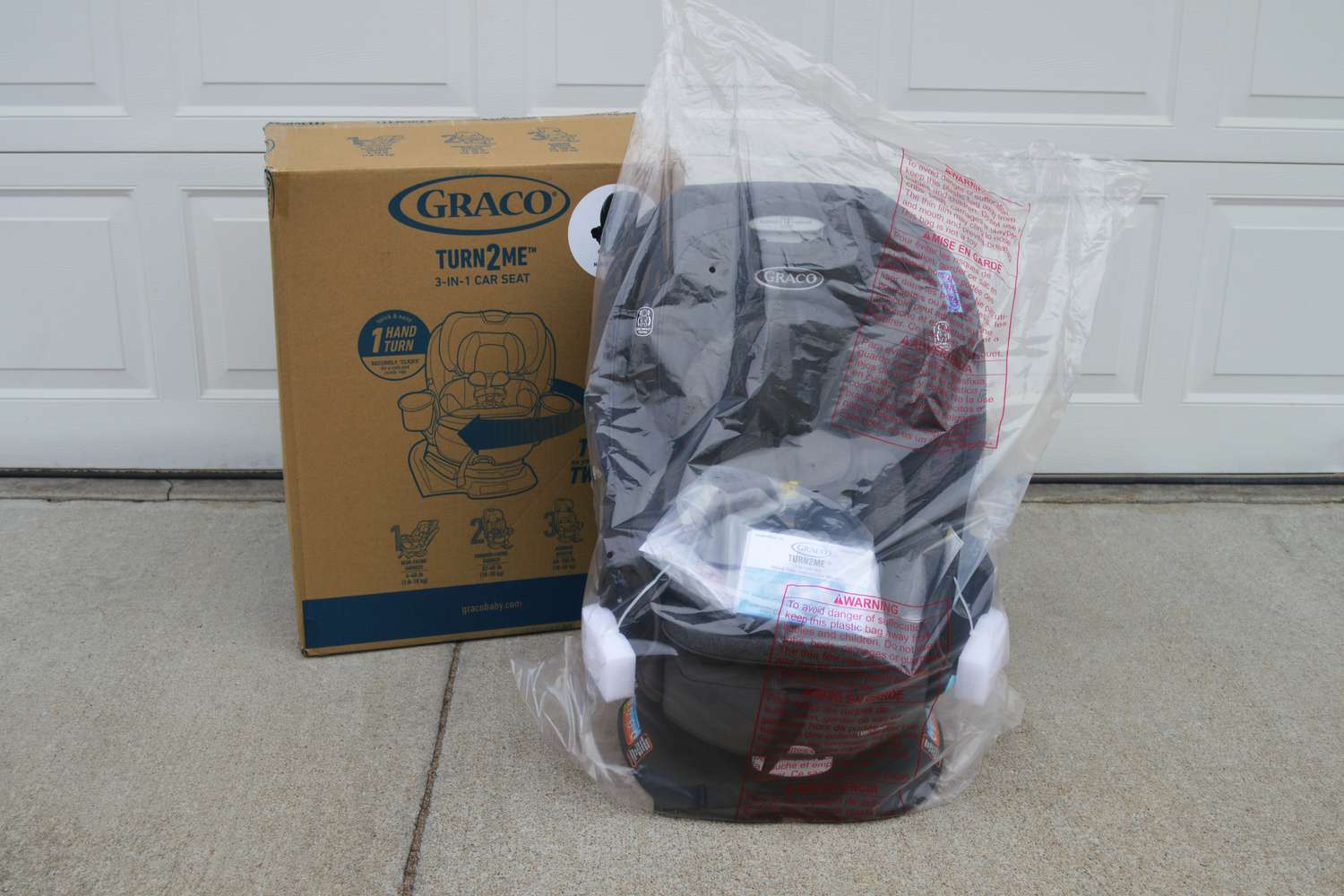 The Graco Turn2Me 3-in-1 Rotating Convertible Car Seat straight out of its packaging