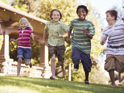 Children running in a yard