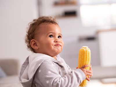 baby with corn