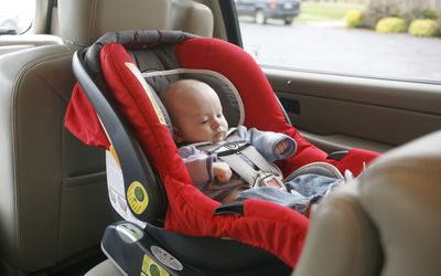 Infant in rear-facing car seat