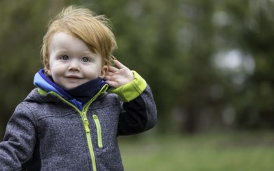 Toddler with red hair and green eyes