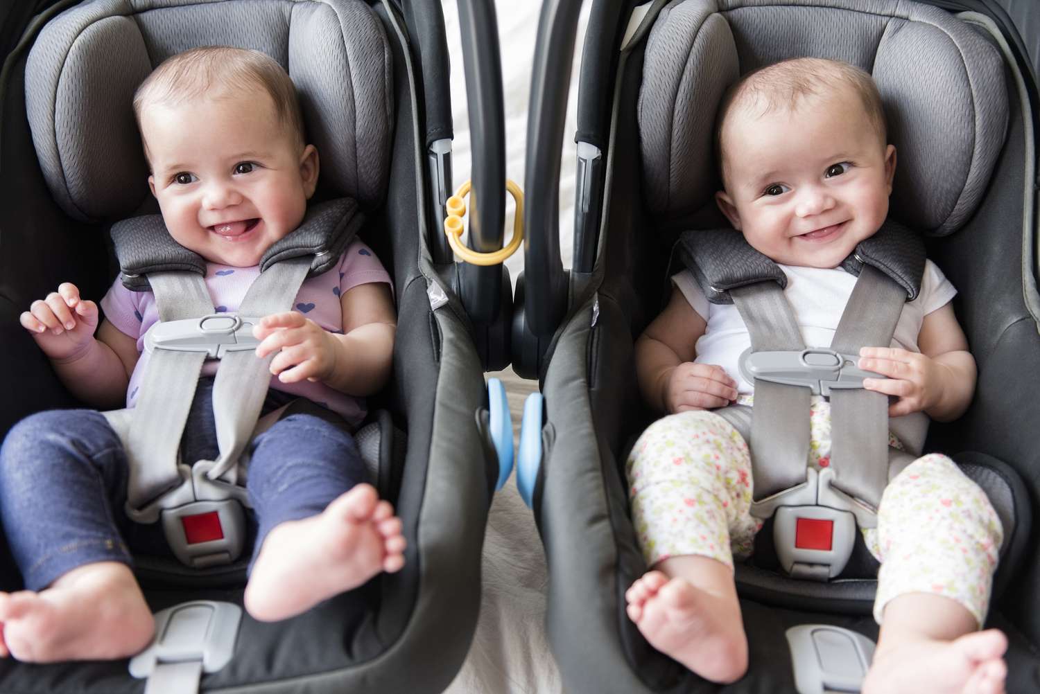 twin babies in car seats