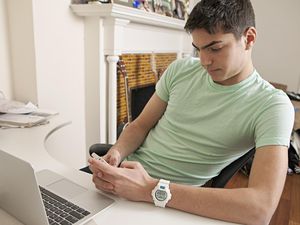 Set healthy limits on your teen's screen time.