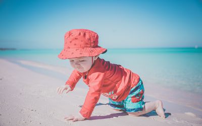 Baby Boy Crawling on Tropical Beach, Cayo Coco, Cuba