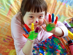 Girl with painted hands