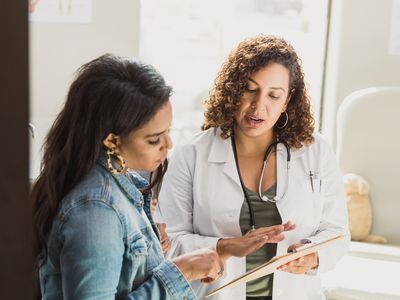 woman talking with doctor about an IUD