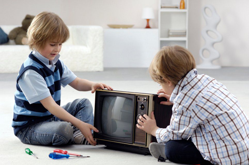 Two Boys Taking TV Apart