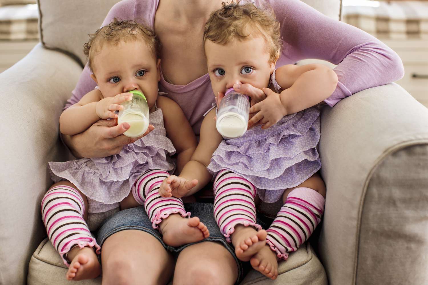 Twin babies in matching outfits