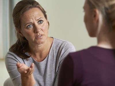 Mature woman talking to another woman
