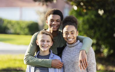 Group of smiling stepsiblings