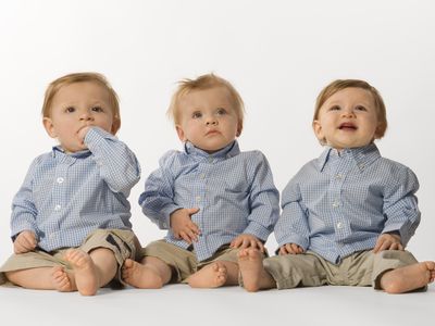 Tripets, three boys sitting on the floor, twins and triplets are a possible risk/side effect of fertility drugs