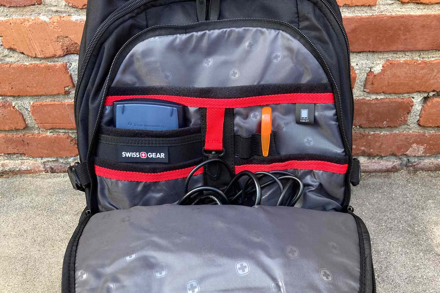 The Swissgear 3760 ScanSmart Laptop Backpack on the floor