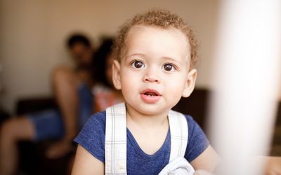 portrait of a baby by the window