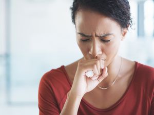 Woman coughing