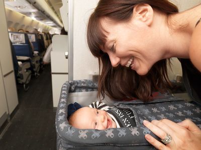 Mother with baby on plane