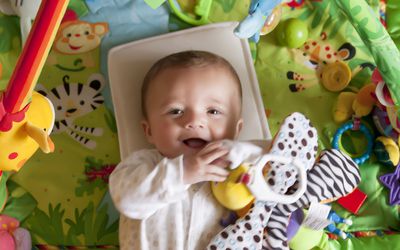 Baby on playmat