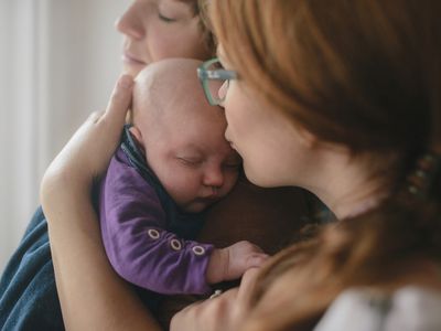 Lesbian couple with newborn baby