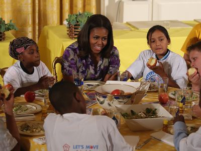 Obesity quotes - Michelle Obama sharing meal with students
