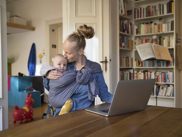 baby in sling with mom