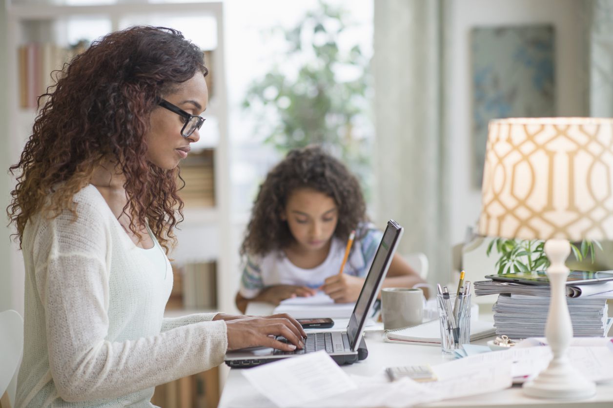 Mom and daughter in home office