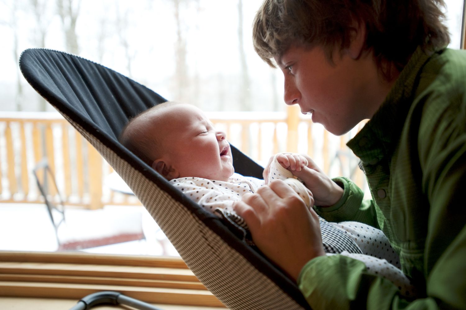 A boy plays with his younger brother in Tennessee.