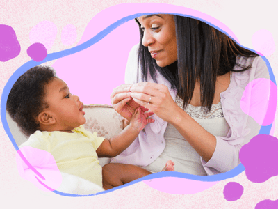 Mom teaching child sign language