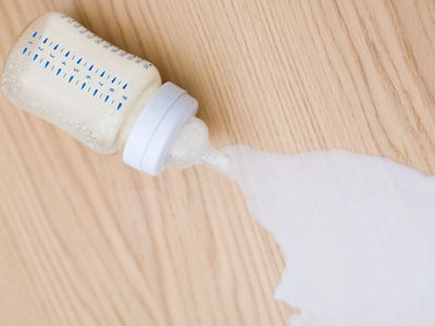 Milk spilling from baby bottle