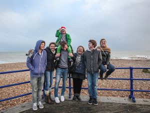 Family at seaside on wintry day