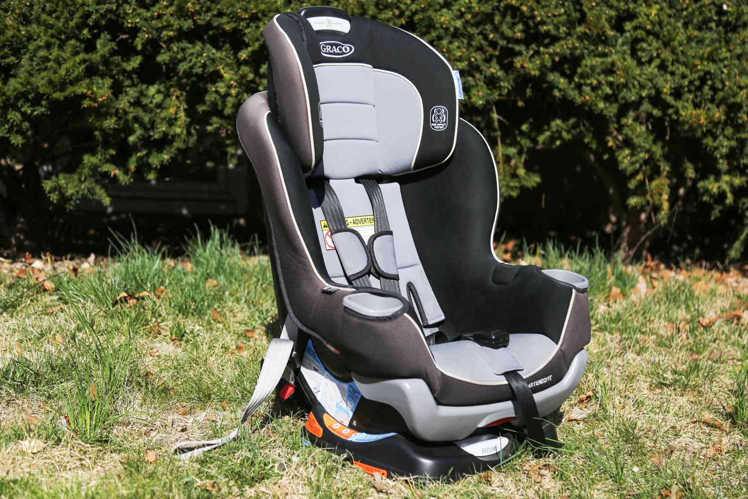 The Graco Extend2Fit Convertible Car Seat sitting on the grass