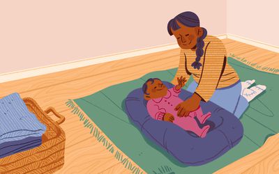 An illustration with a person supervising a child in a baby lounger on the floor