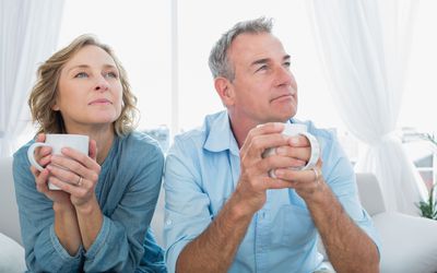 mature parents looking thoughtful