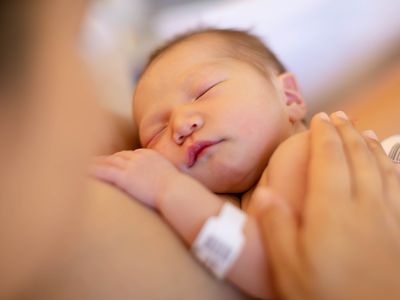 newborn with mother in hospital