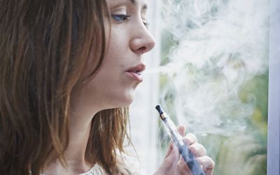 Woman with an e-cigarette