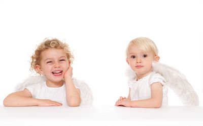 Two cherubs - stock photo