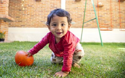 baby boy playing outside