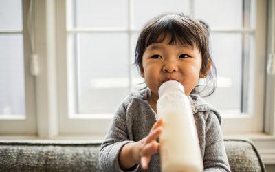 toddler drinking milk