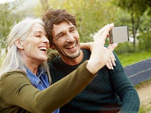 Mother and son taking selfie