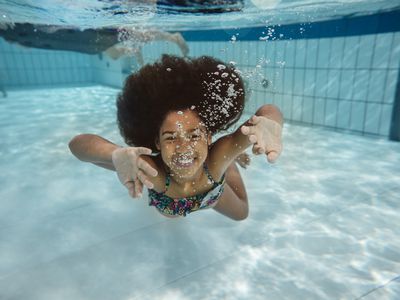 young girl swimming