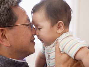 Chinese grandfather with grandchild