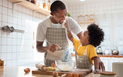 Father and child baking
