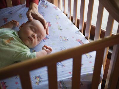 baby sleeping in crib