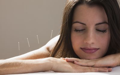 Woman feeling very calm during acpuncture