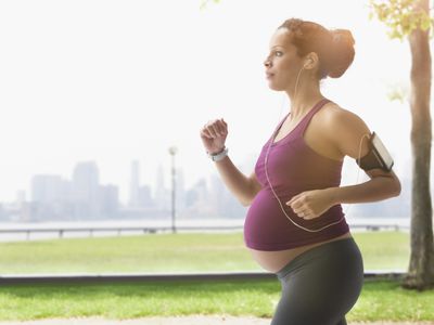 Pregnant woman exercising outside