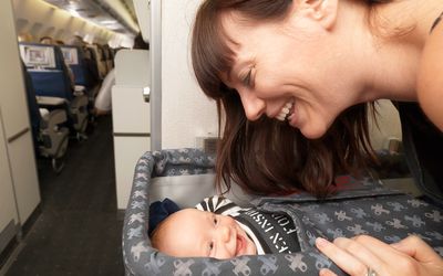 Mother with baby on plane