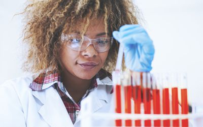 Woman in lab running a test
