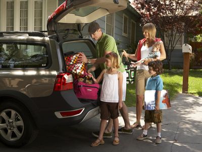 Family packing car for trip