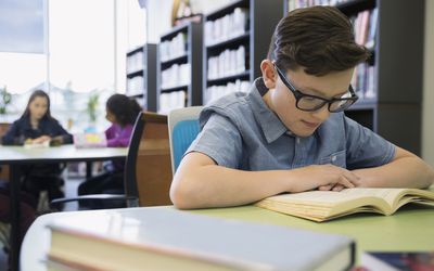 Students reading in a school library.